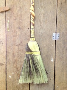 House broom with a double wrap on a twisted handle