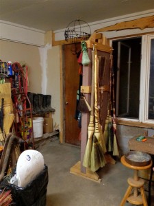 One corner of Shawn's shop with the brooms on display